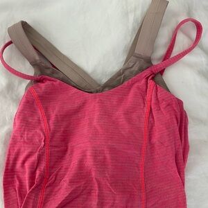 Lululemonn tank top with built in bra! Most likely a size 2 but no tag